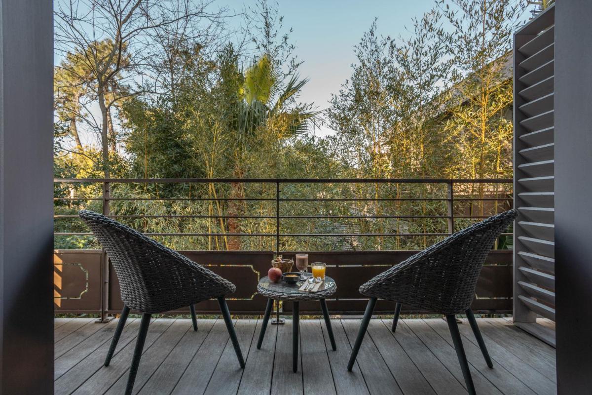 Balcon ou terrasse dans l'établissement Hôtel Côté Sable