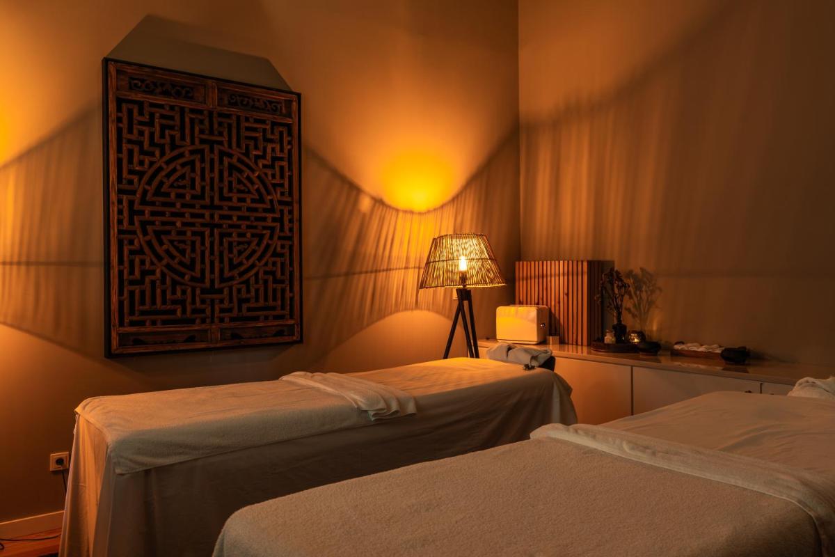 Uma cama ou camas num quarto em SENSI Azores Nature and SPA