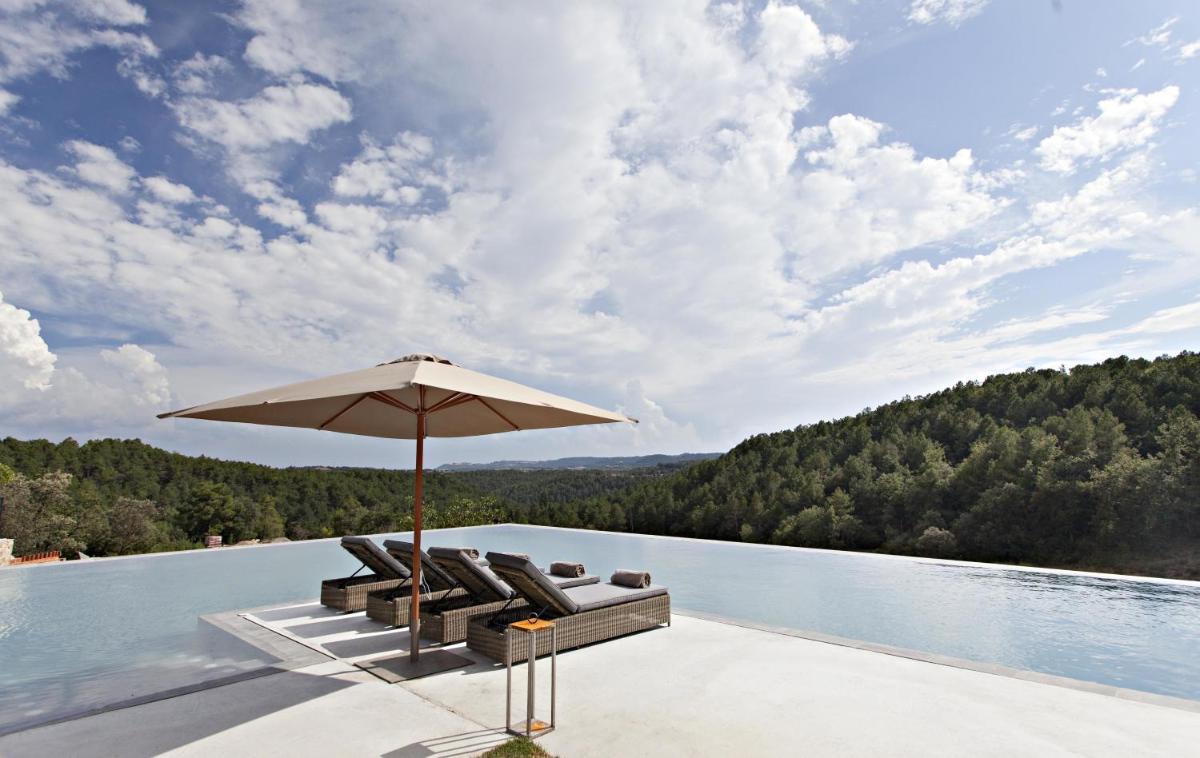 Piscina en o cerca de La Vella Farga Hotel
