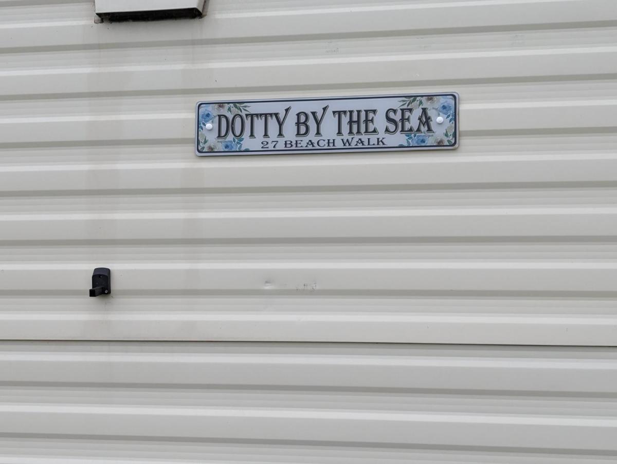 Dotty By The Sea, 27 BW, St Osyth Beach - price is whole caravan with field views - Housity