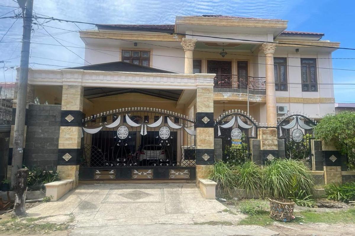 OYO 93502 Homestay Pakmuklis Syariah 2 - Housity