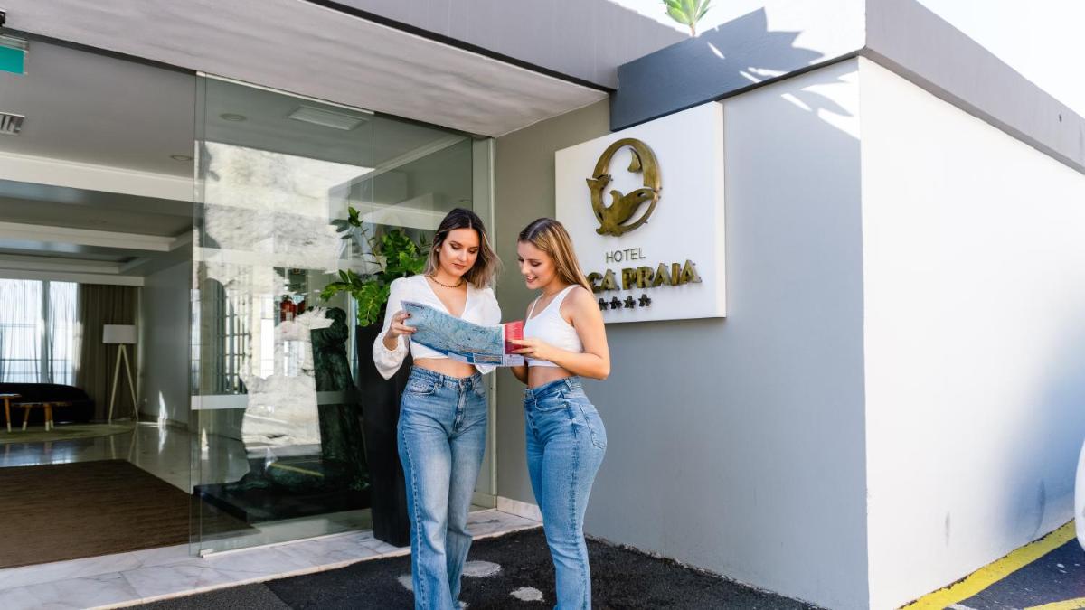 Os clientes hospedados em Hotel Orca Praia