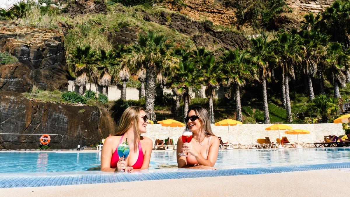 Os clientes hospedados em Hotel Orca Praia