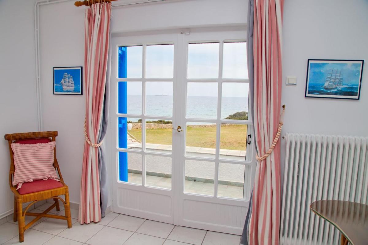 Aroura Homes 4BR Beachfront Villa - Housity