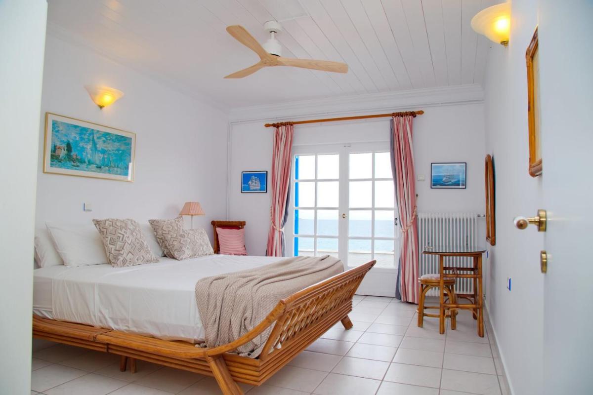 Aroura Homes 4BR Beachfront Villa - Housity