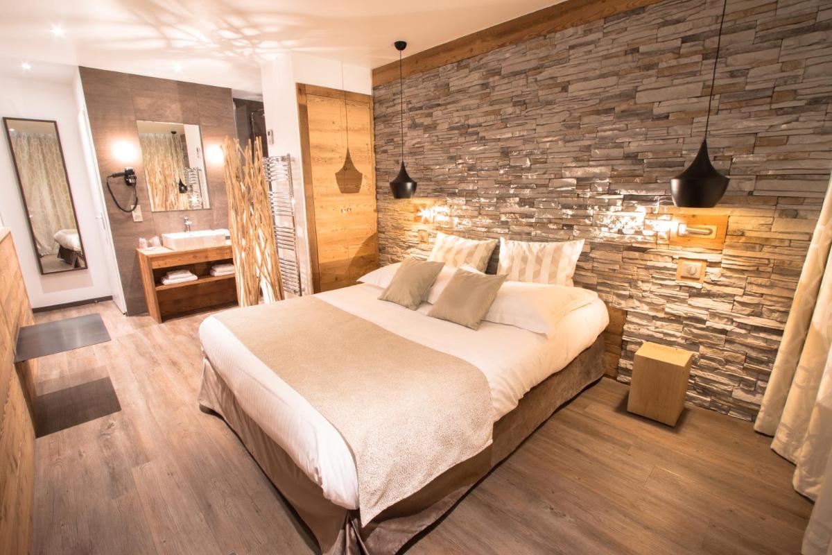 Un ou plusieurs lits dans un hébergement de l'établissement Hôtel des Princes, Chambéry Centre