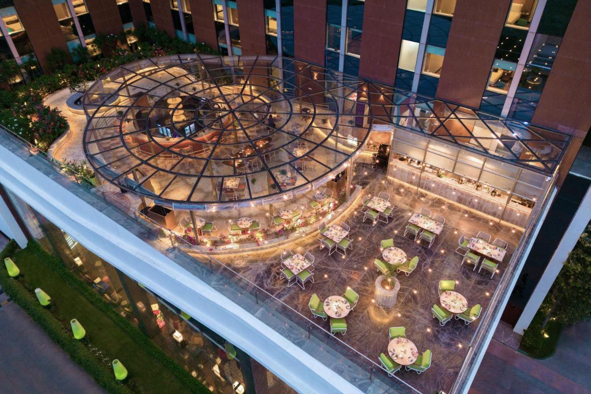 an aerial view of a restaurant on a building at Aloft Bengaluru Outer Ring Road in Bengaluru