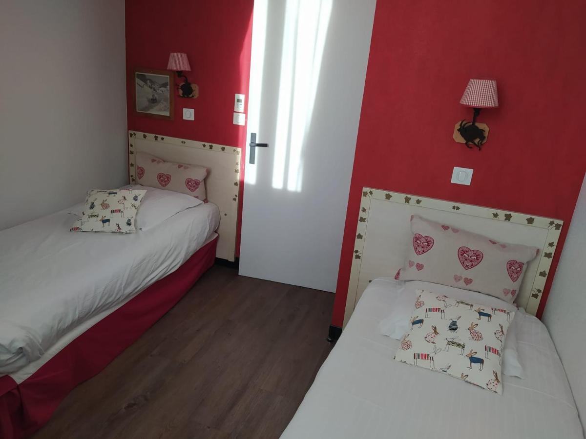Un ou plusieurs lits dans un hébergement de l'établissement Hôtel des Princes, Chambéry Centre