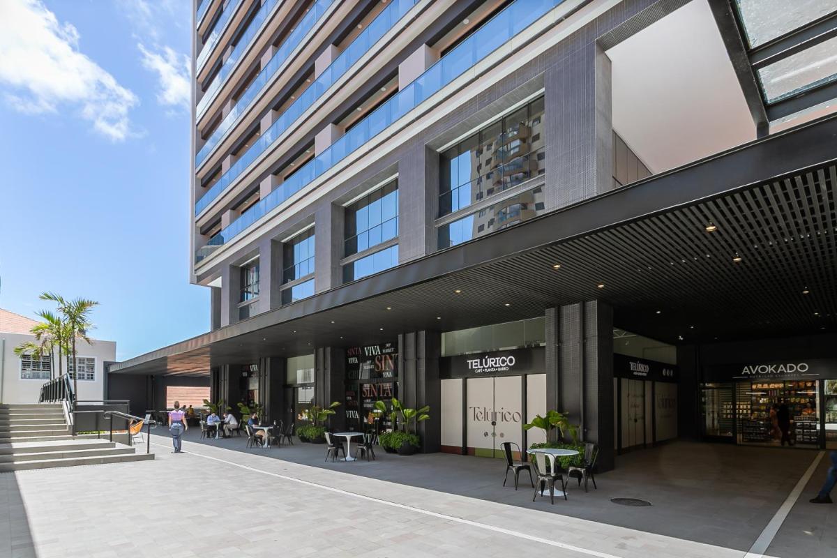 HOMS Studios Tower - Prédio com piscina e estacionamento - Housity