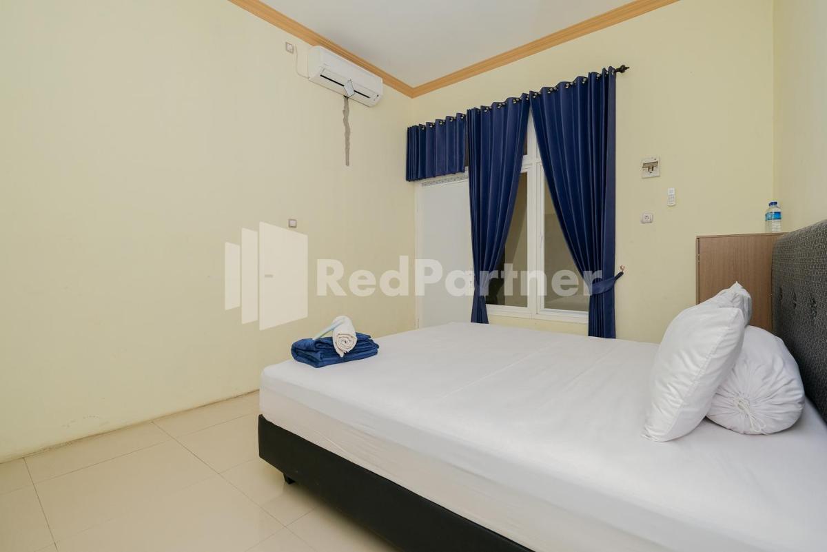 Grand Kencana Guesthouse near Wisata Bahari Lamongan Mitra RedDoorz - Housity