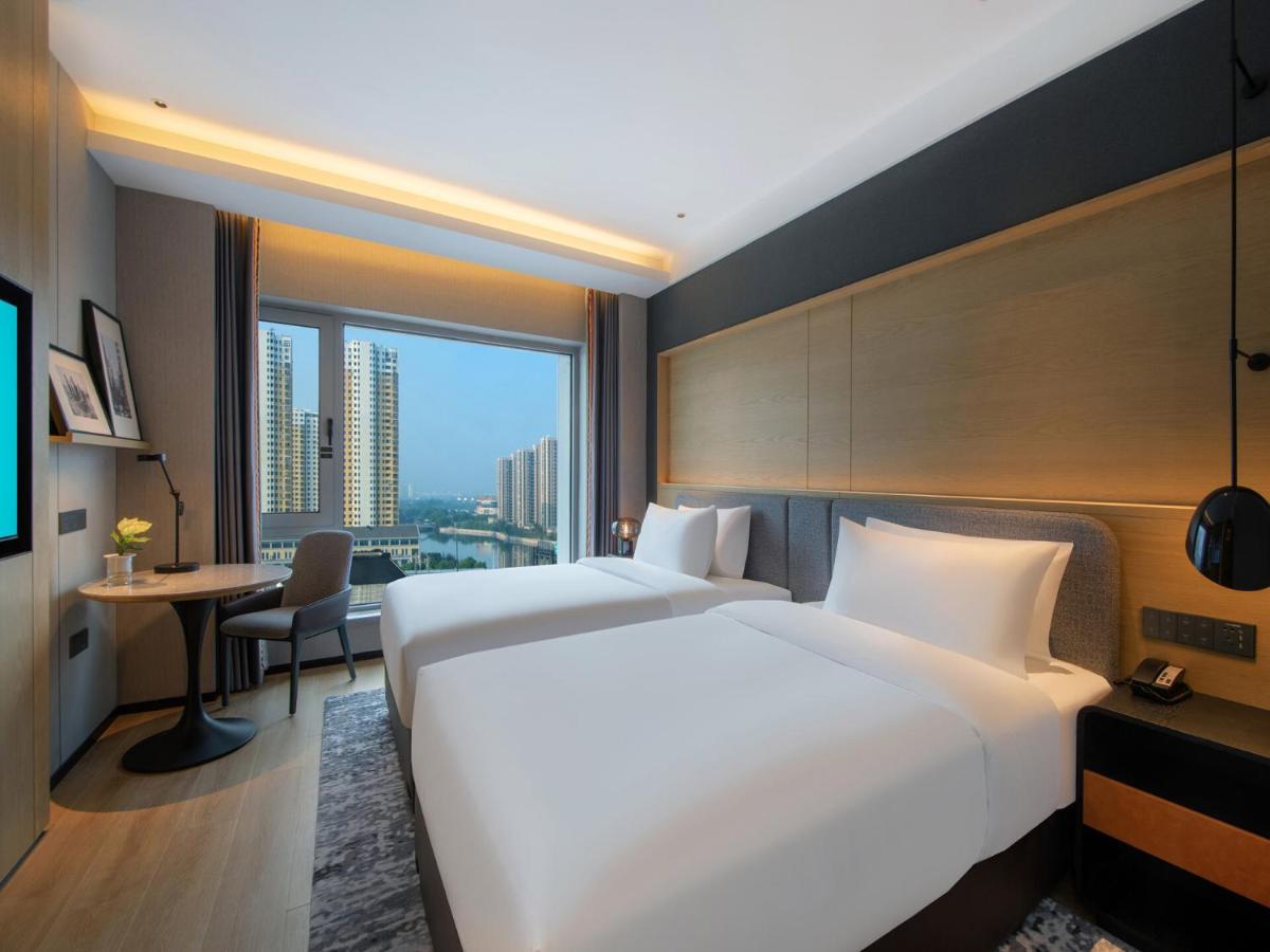 Park Inn by Radisson Shaoxing China Keqiao - Housity
