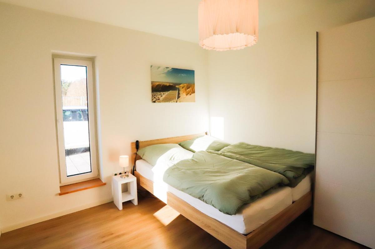 Ferienhaus am Tramser See - Housity