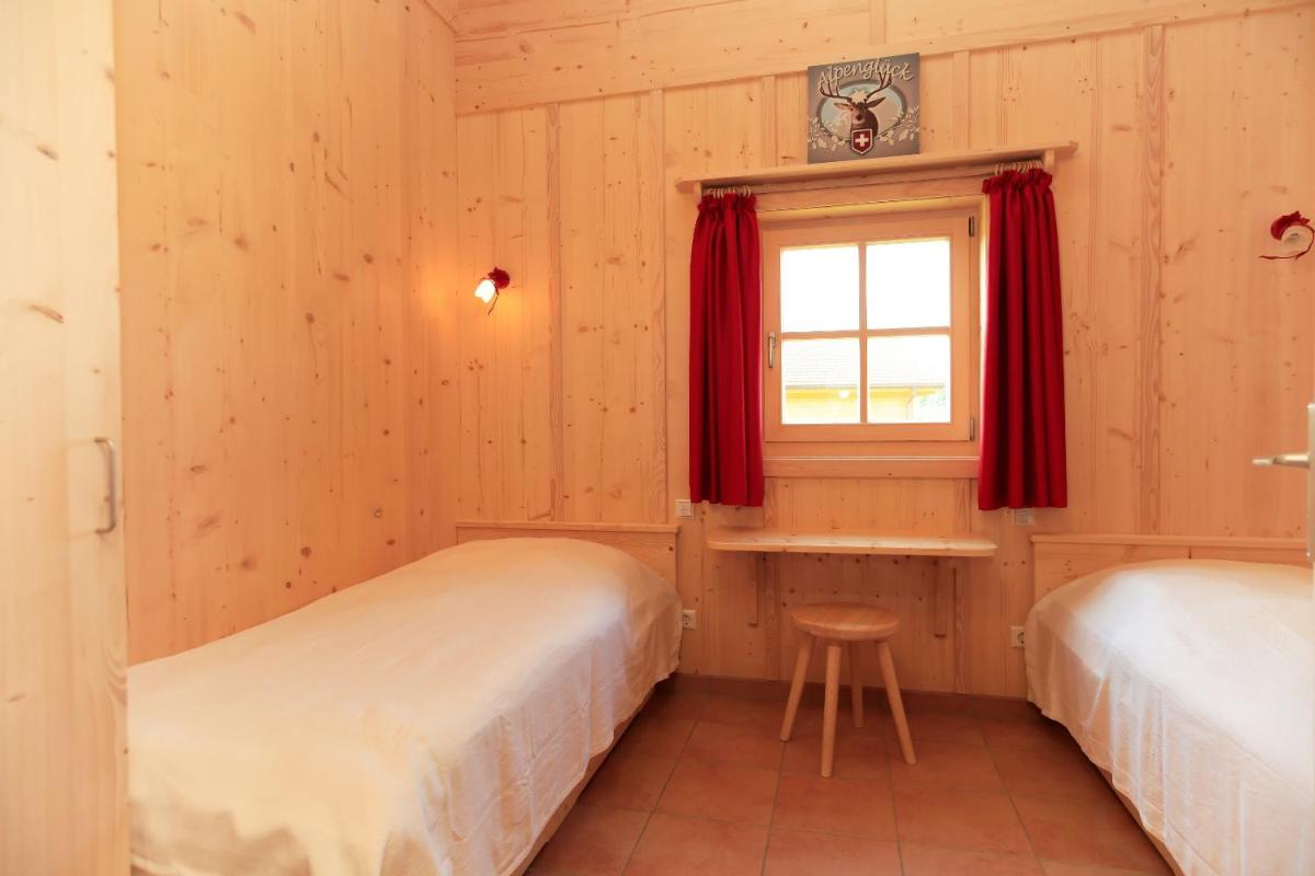 Alpenchalets Hotel Lambach - Housity