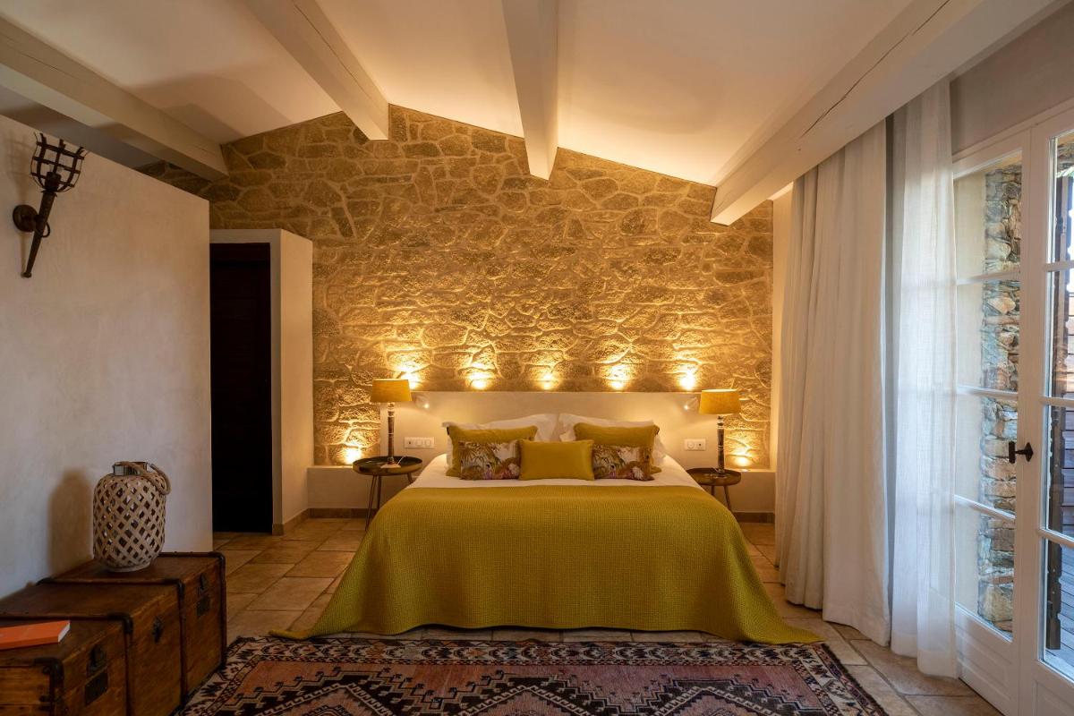 Un ou plusieurs lits dans un hébergement de l'établissement Hôtel La Dimora & Spa