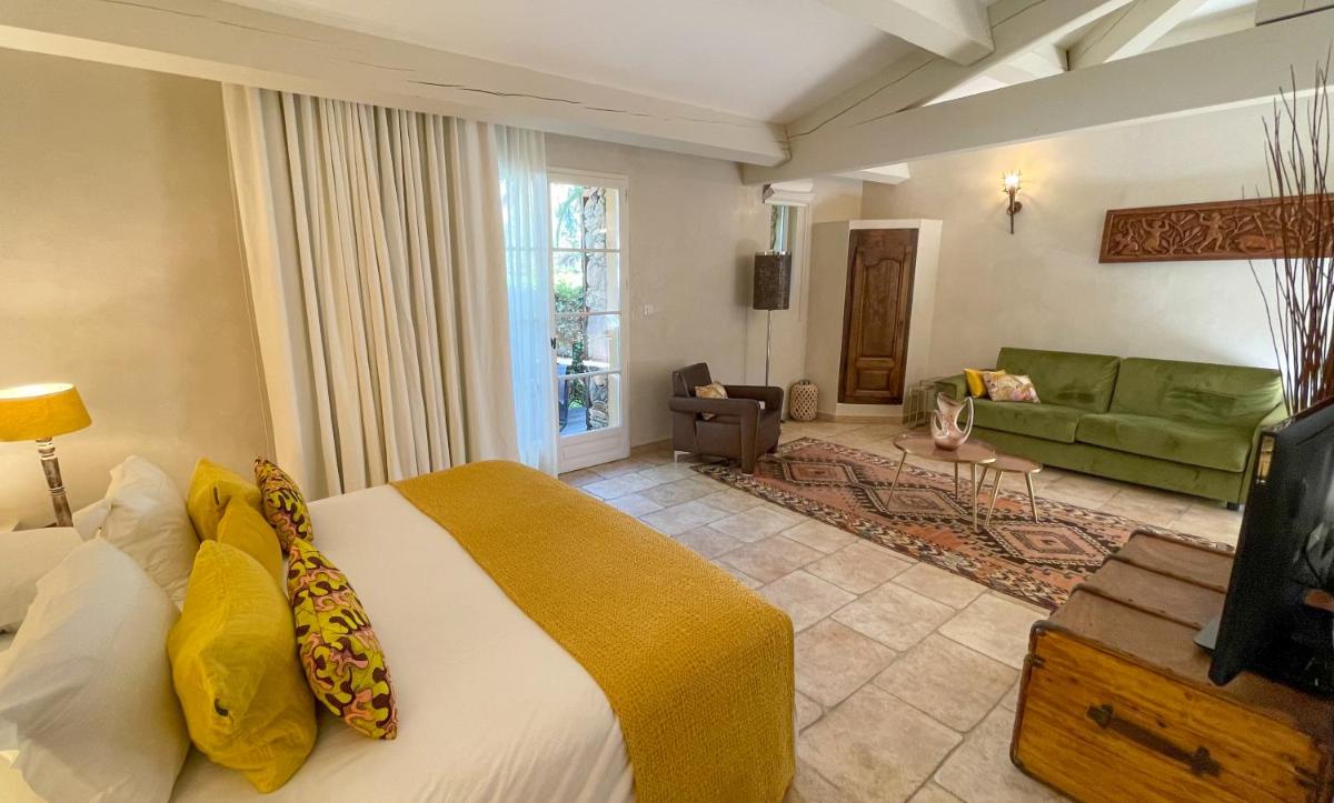 Un ou plusieurs lits dans un hébergement de l'établissement Hôtel La Dimora & Spa