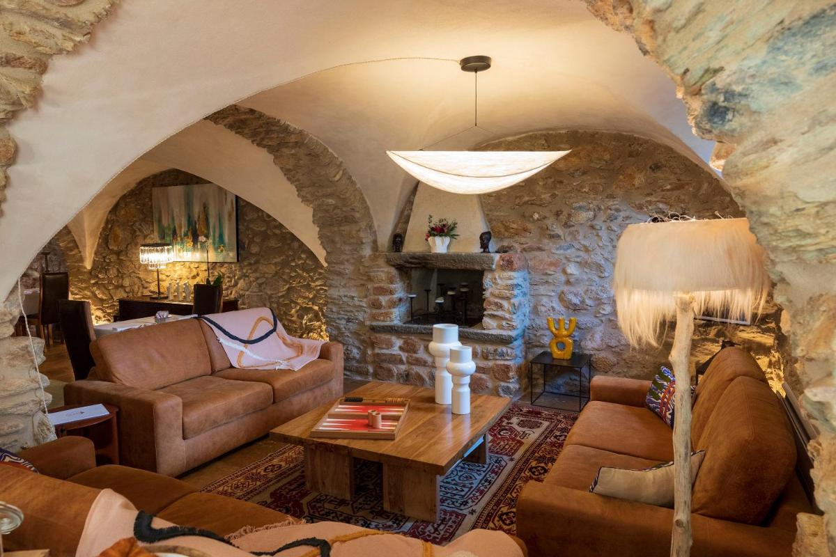 Coin salon dans l'établissement Hôtel La Dimora & Spa