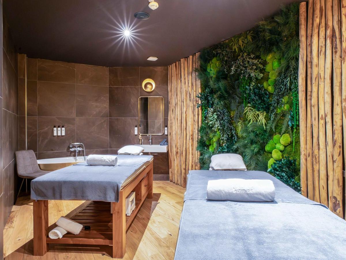 Un ou plusieurs lits dans un hébergement de l'établissement Hôtel Le Diamond Rock