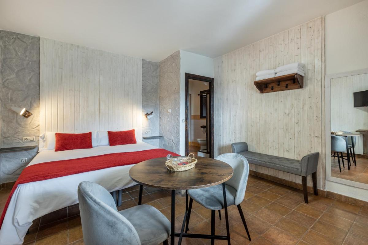 Cama o camas de una habitación en Turismo Rural & SPA El Cercado