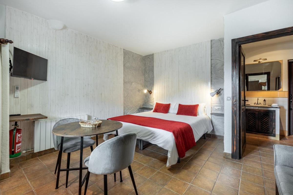 Cama o camas de una habitación en Turismo Rural & SPA El Cercado