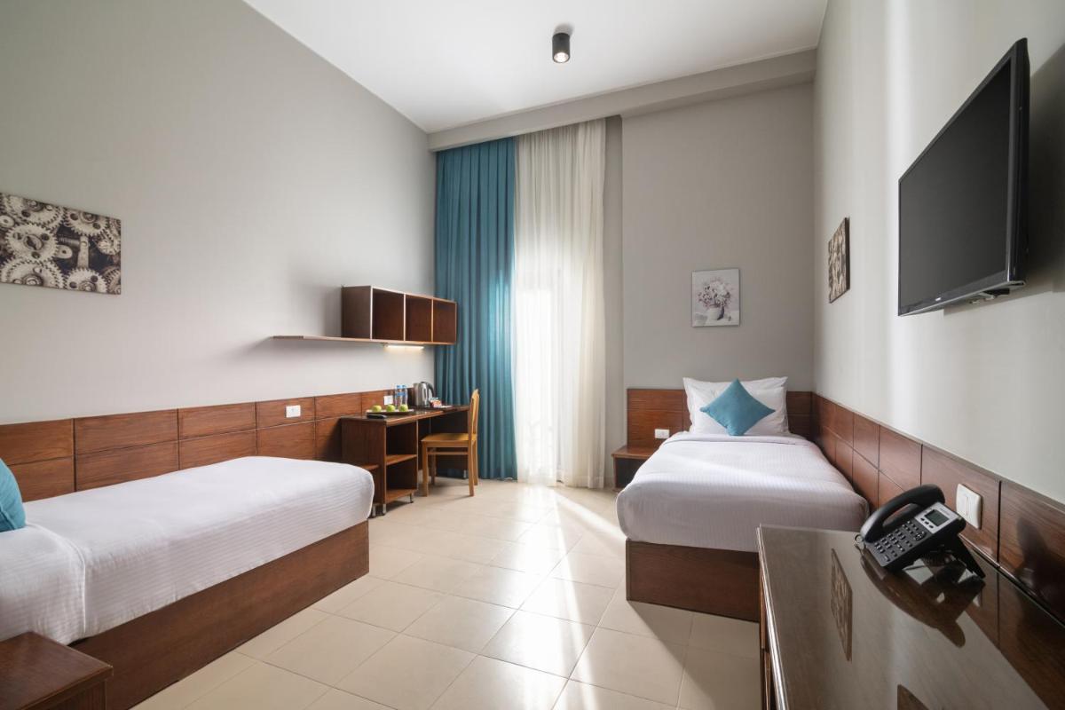 Dhara Residence E2 Lodge Hotel - Housity
