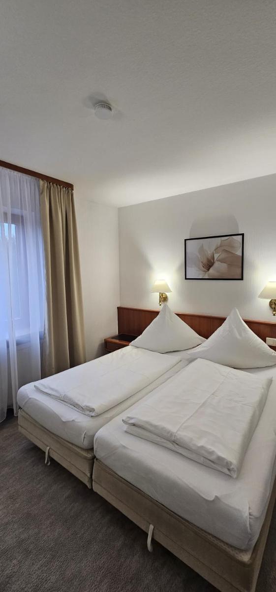 Hotel Garni Vierjahreszeiten - Housity