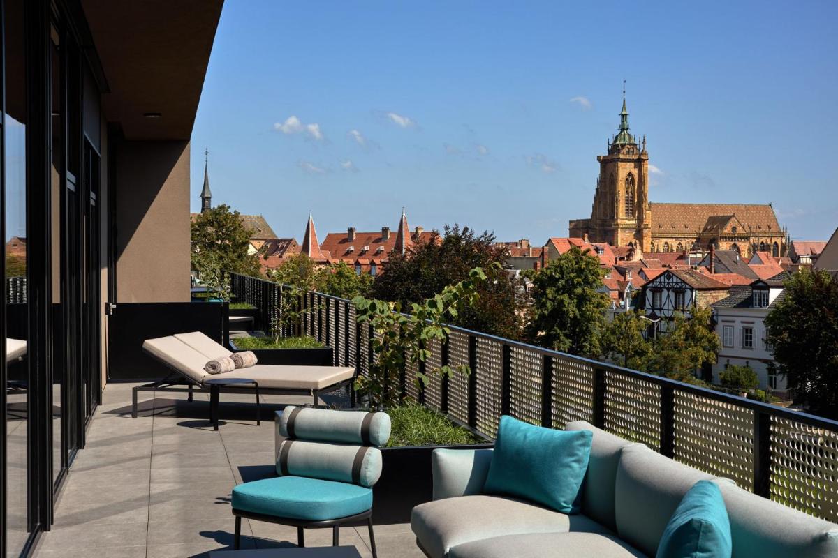 Coin salon dans l'établissement L'Esquisse Hotel & Spa Colmar - MGallery Collection