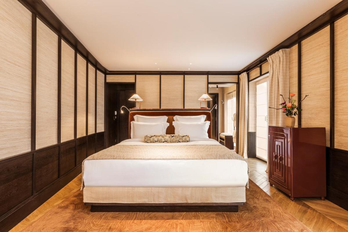 Un ou plusieurs lits dans un hébergement de l'établissement Hotel Hana
