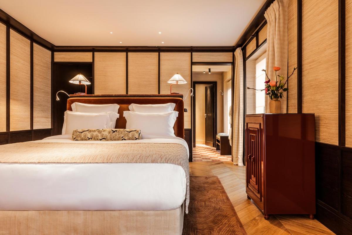 Un ou plusieurs lits dans un hébergement de l'établissement Hotel Hana