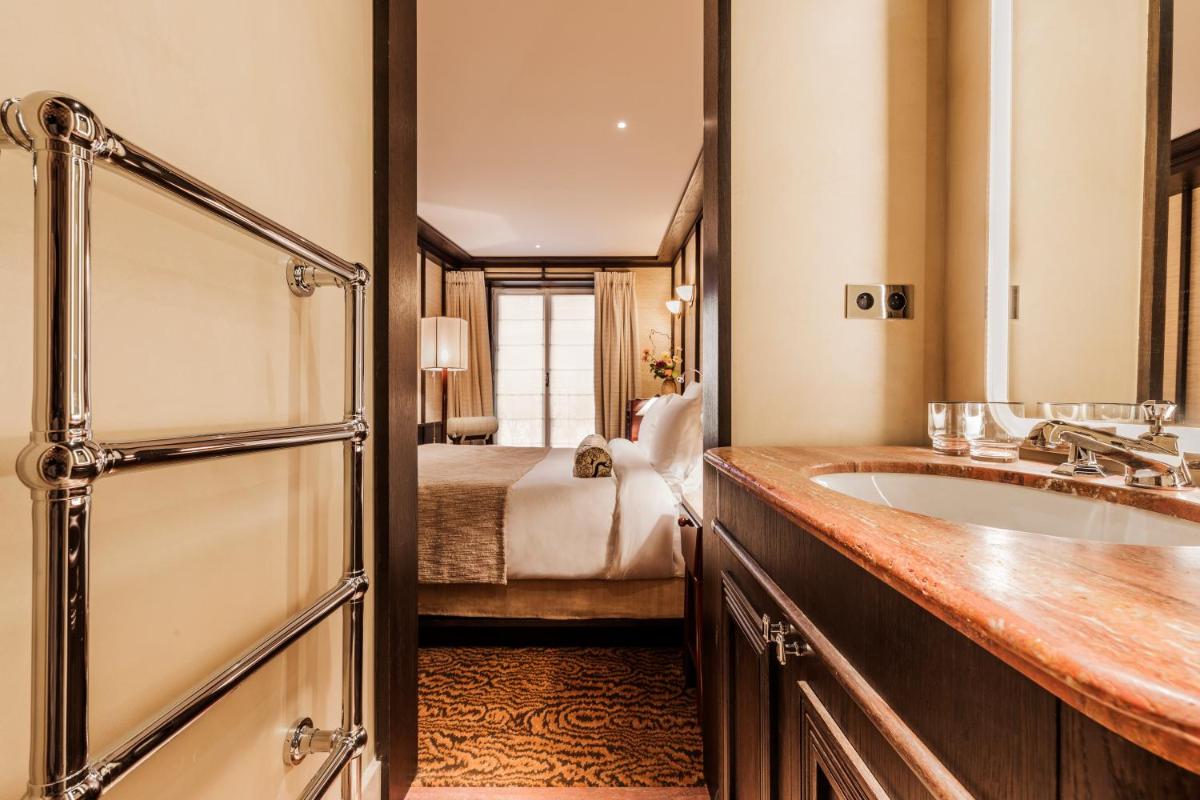 Un ou plusieurs lits dans un hébergement de l'établissement Hotel Hana