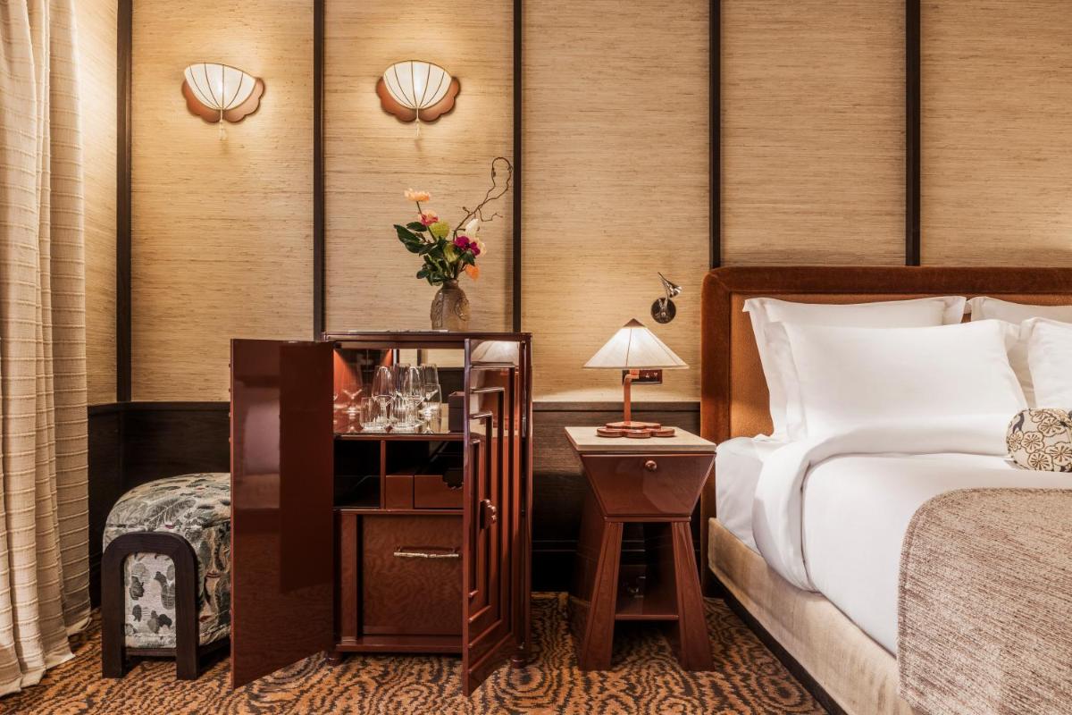 Un ou plusieurs lits dans un hébergement de l'établissement Hotel Hana