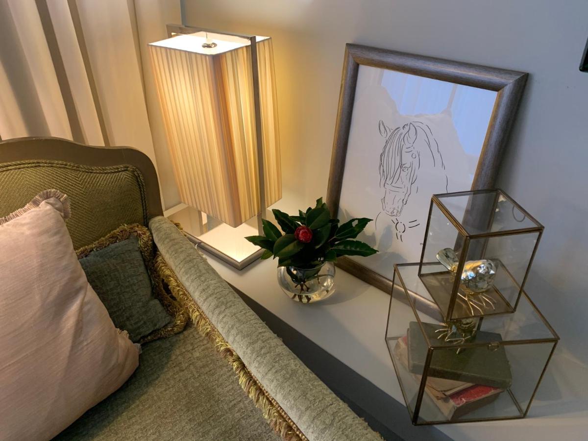 Uma cama ou camas num quarto em Carmo's Boutique Hotel - Small Luxury Hotels of the World
