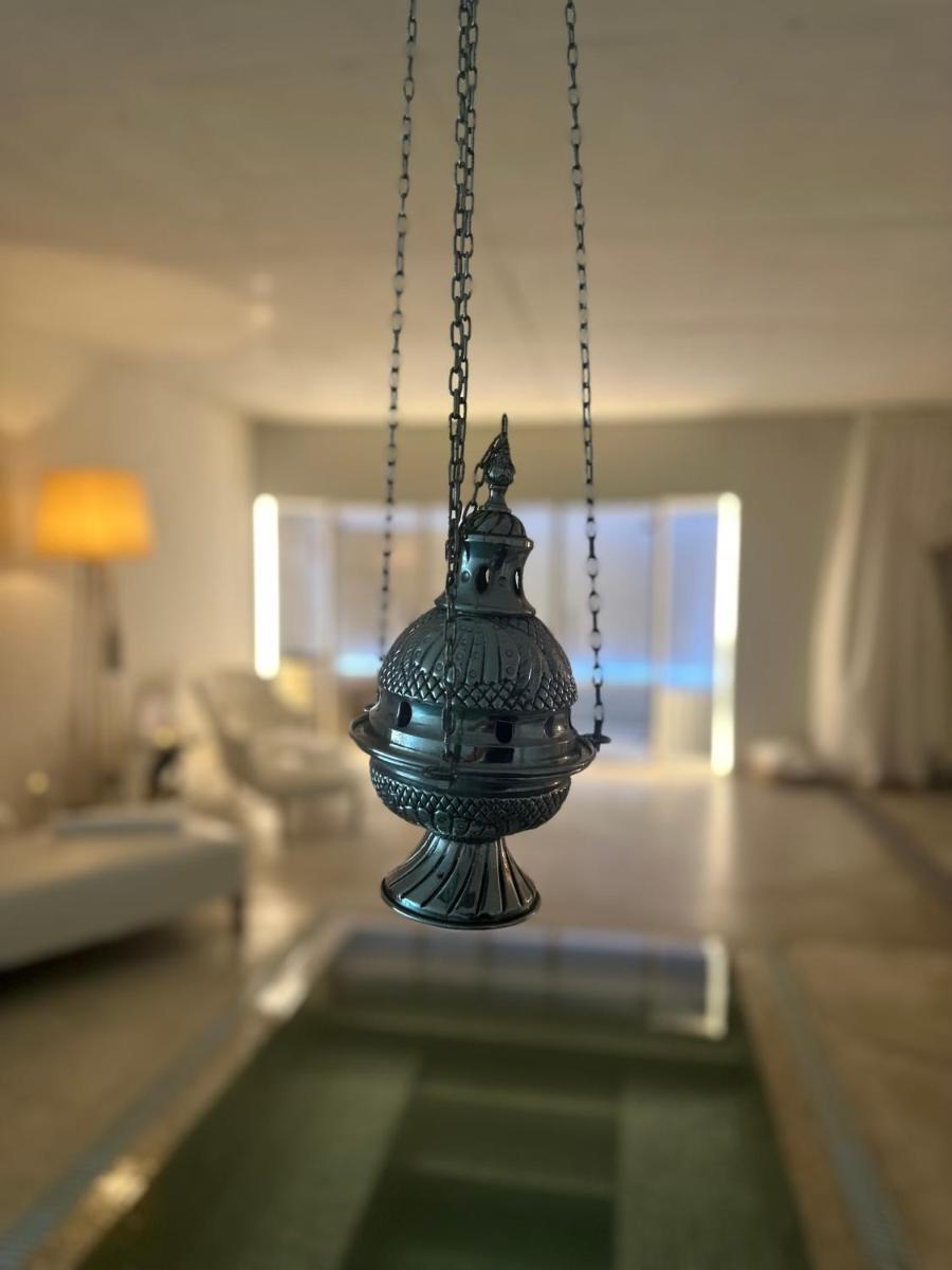 Uma cama ou camas num quarto em Carmo's Boutique Hotel - Small Luxury Hotels of the World