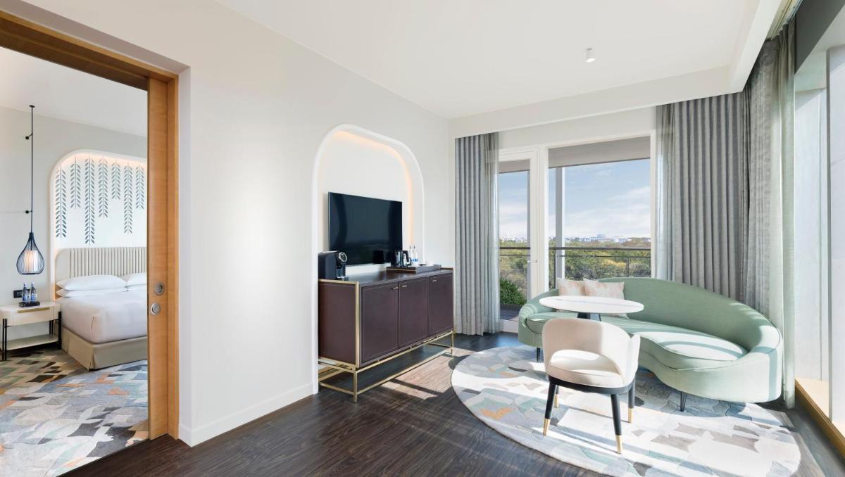 a rendering of a hotel room with a bedroom at InterContinental Jaipur Tonk Road by IHG in Jaipur