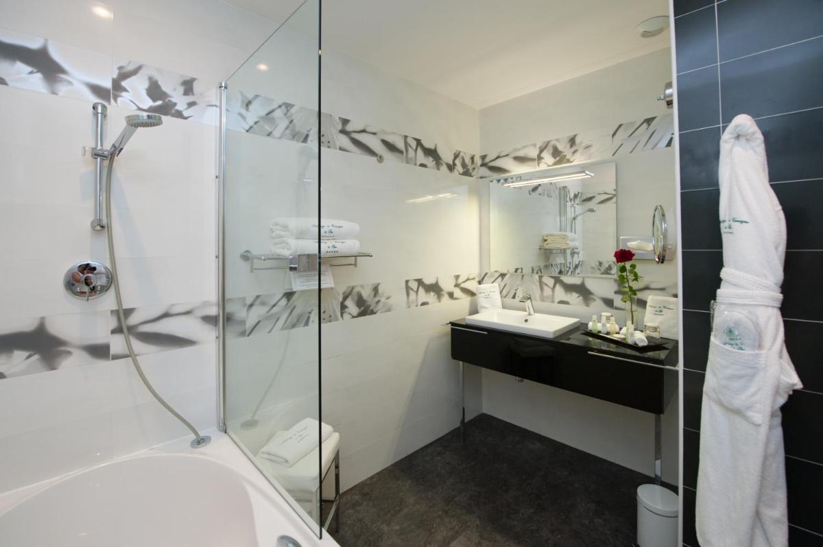 Salle de bains dans l'établissement Auberge de Cassagne & Spa