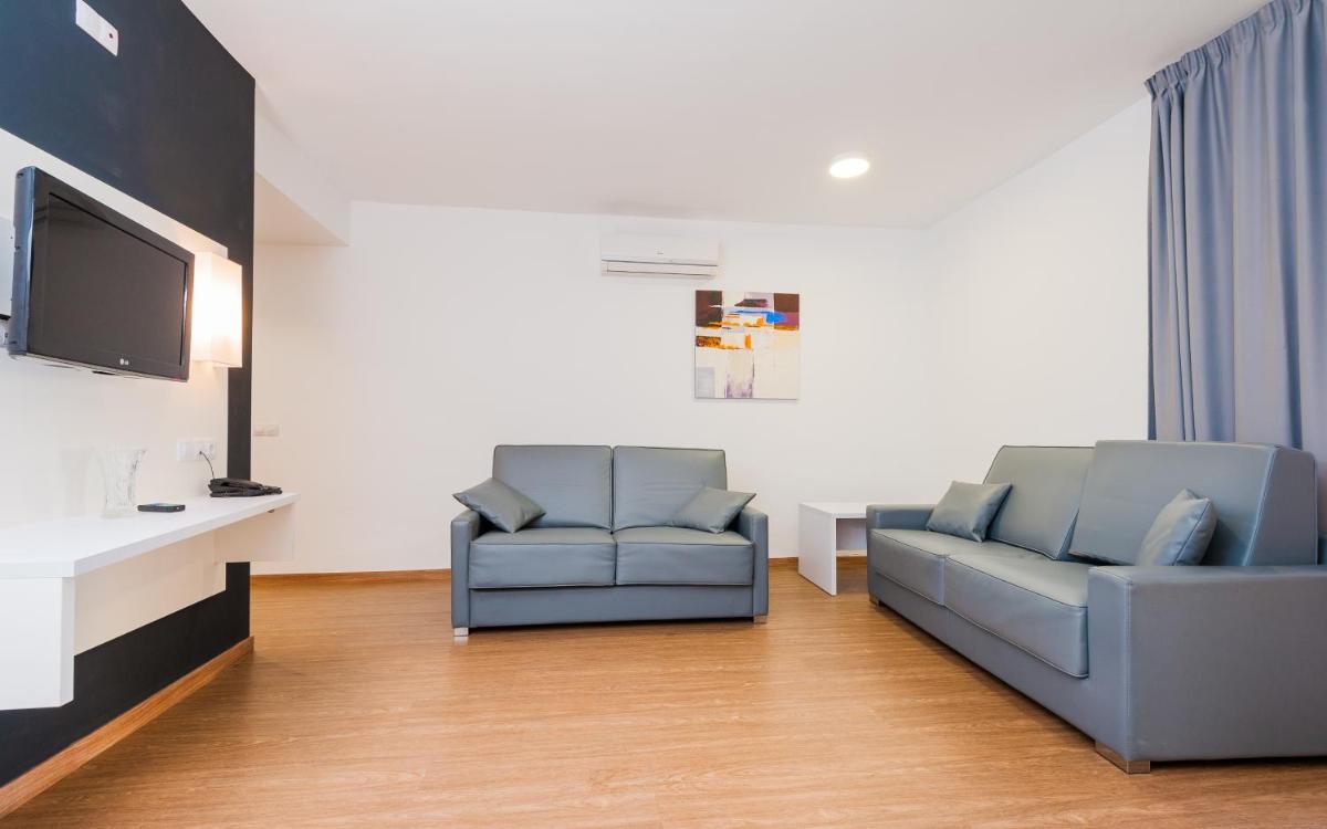 Zona de estar de Kn Aparthotel Columbus