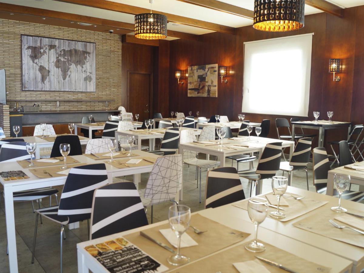 Un restaurante o sitio para comer en Spa Hotel Ciudad de Teruel