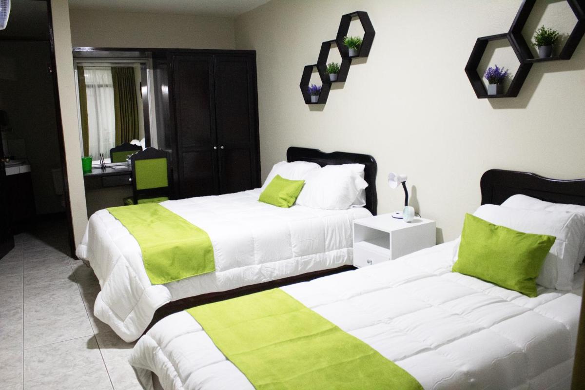 Hotel América Heredia - Housity