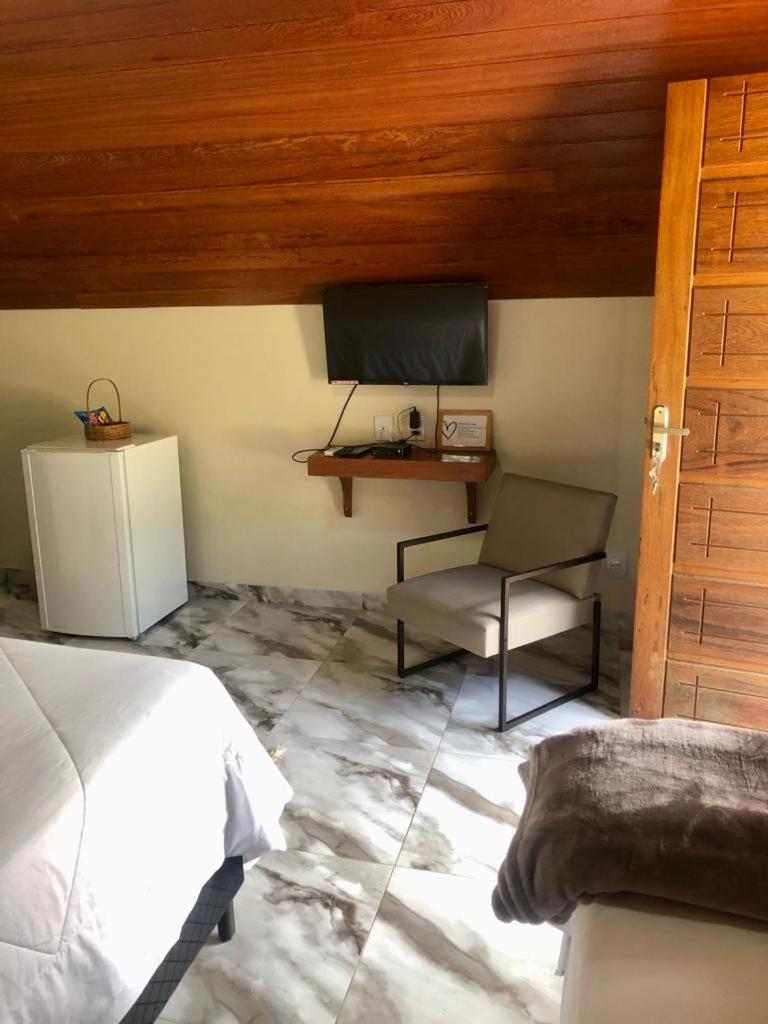 Pousada Chalé dos Ipês - Housity