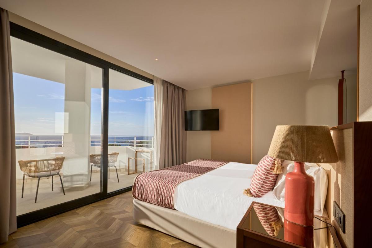 Cama o camas de una habitación en TRS Ibiza Hotel - Adults Only