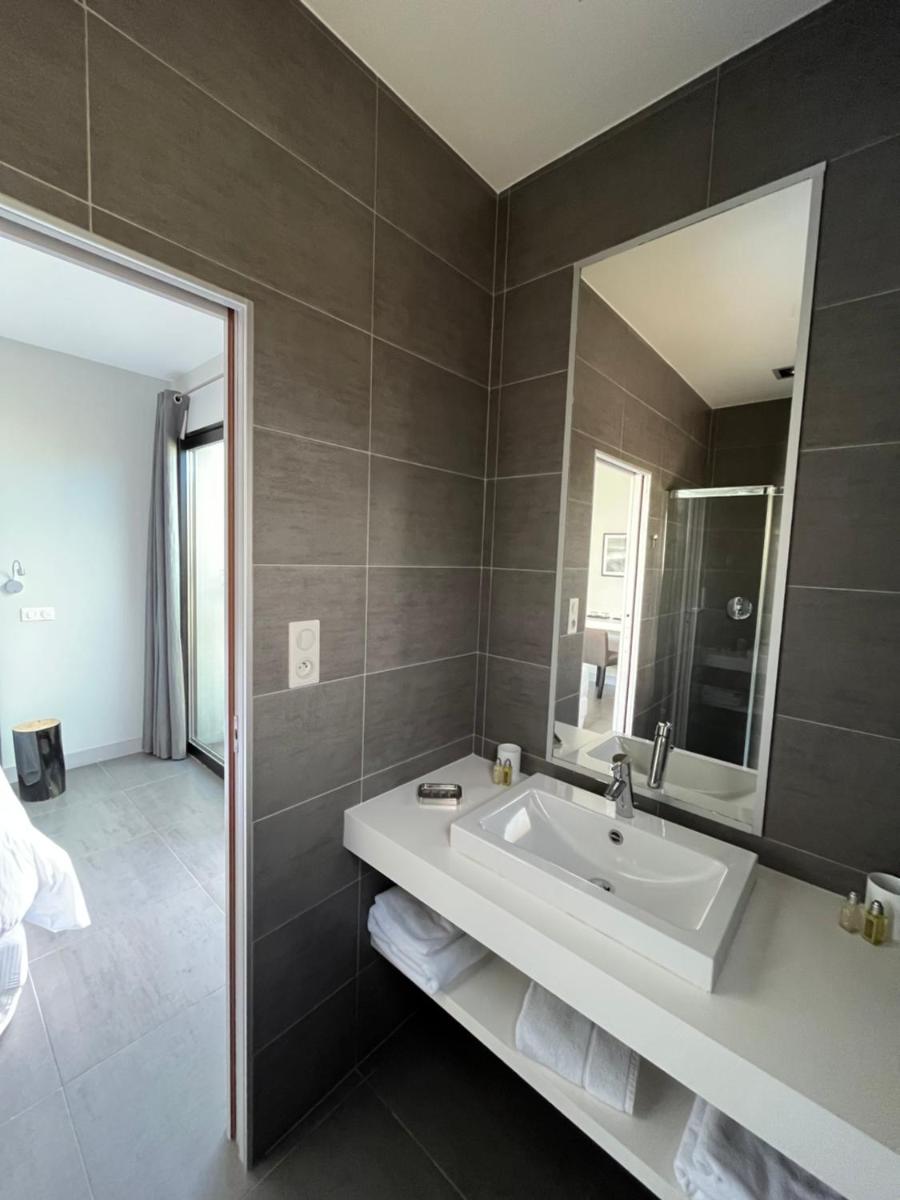 Salle de bains dans l'établissement Lafitenia Resort