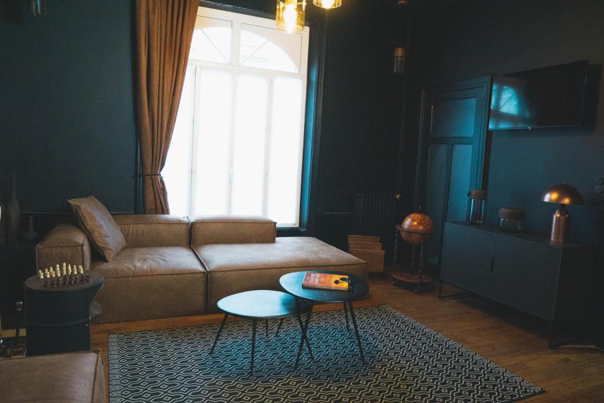 Coin salon dans l'établissement Villa37