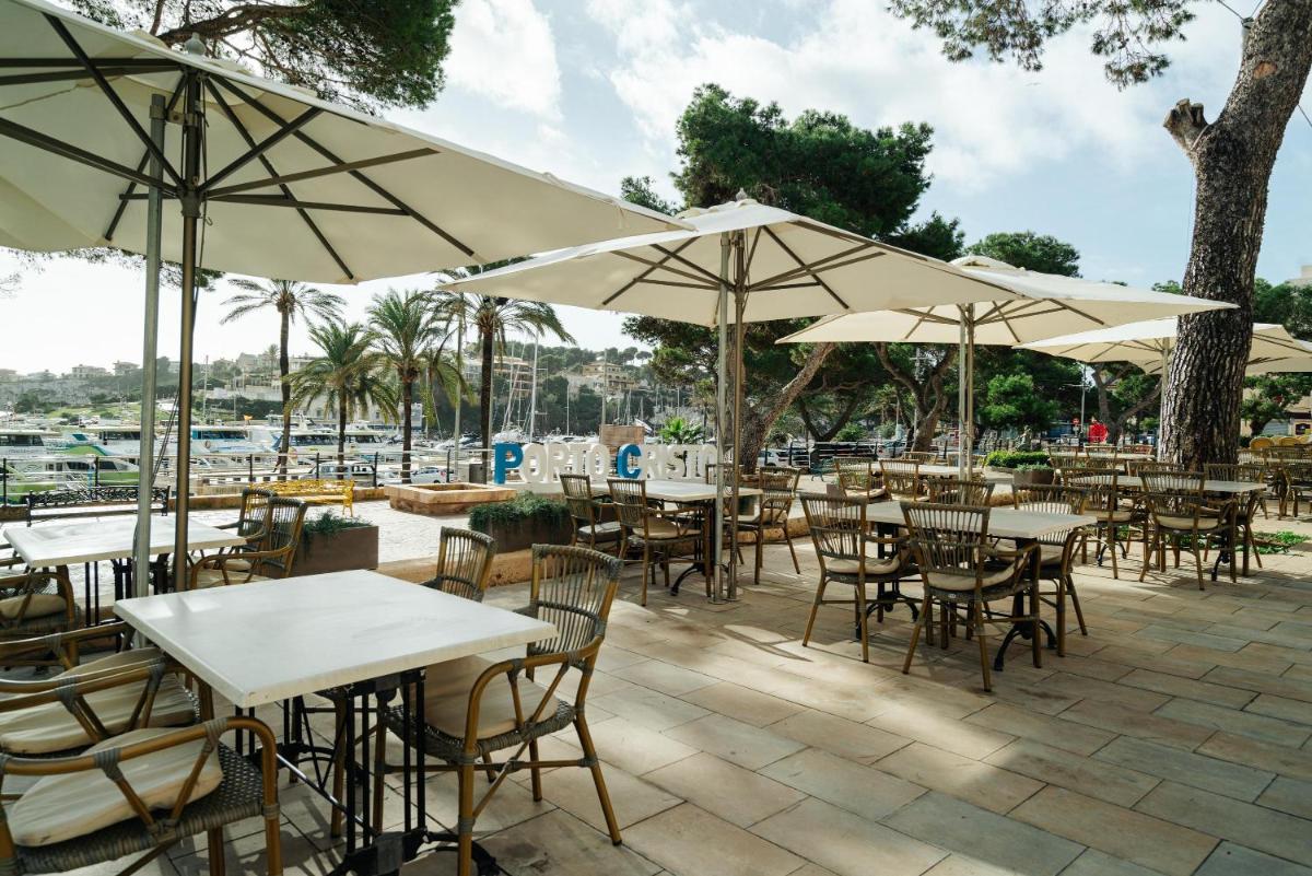 Un restaurante o sitio para comer en THB Felip - Adults Only