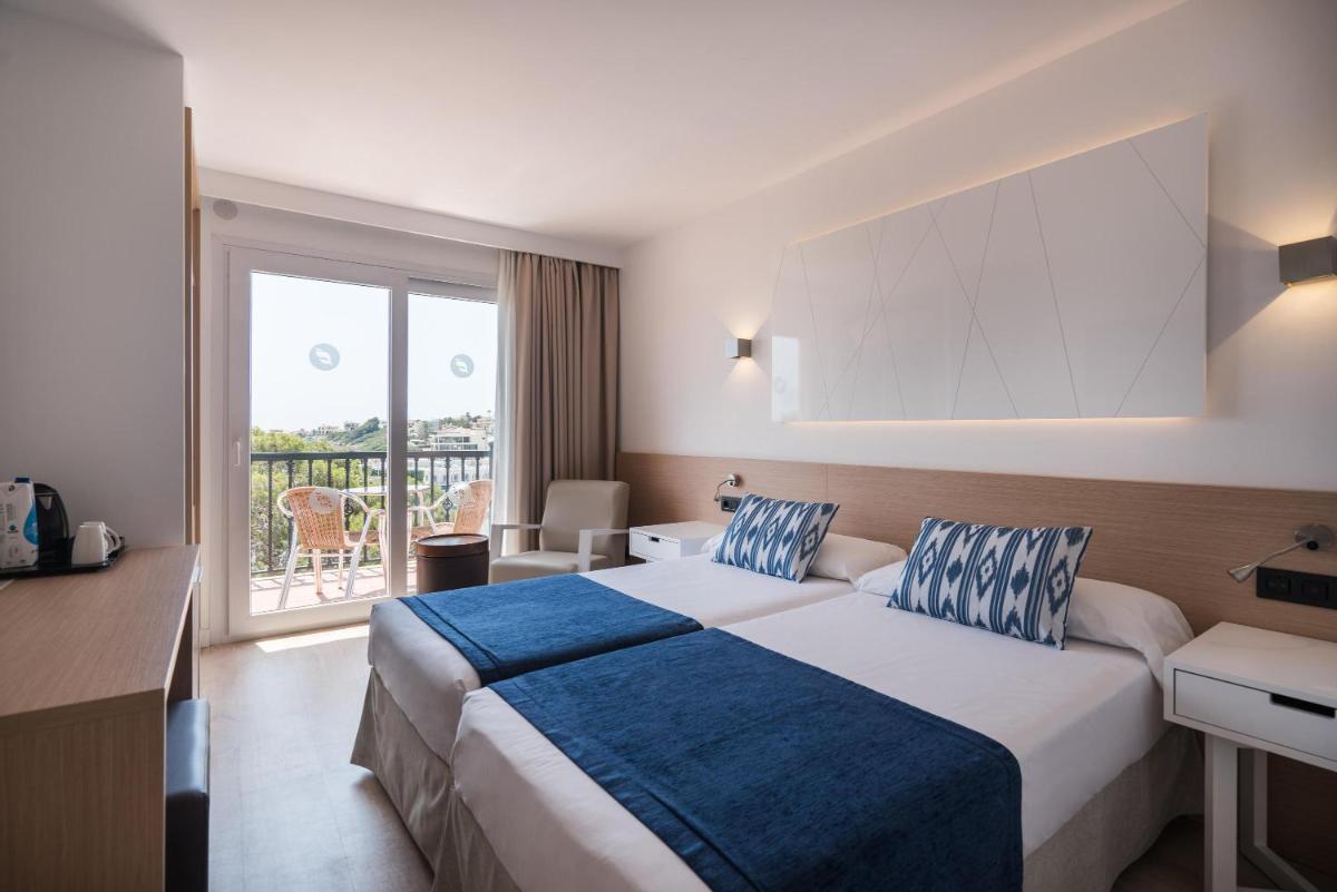 Cama o camas de una habitación en THB Felip - Adults Only