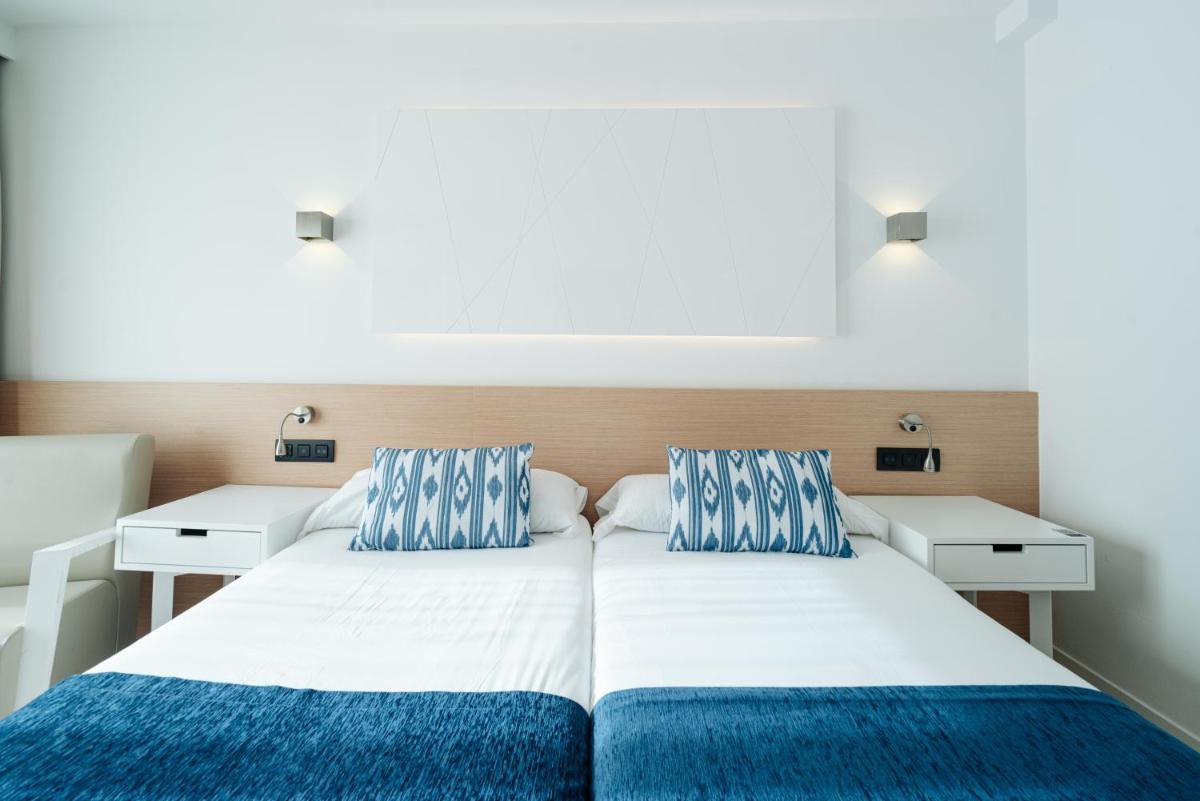 Cama o camas de una habitación en THB Felip - Adults Only