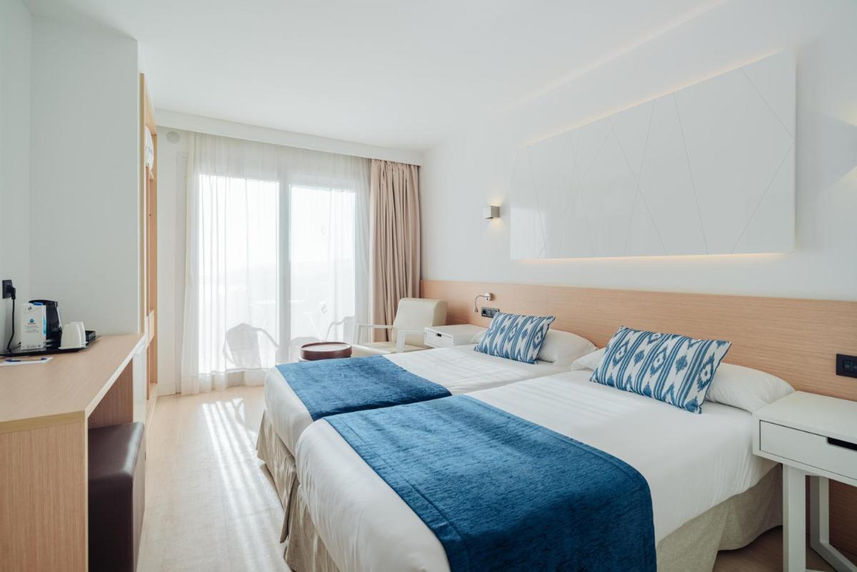 Cama o camas de una habitación en THB Felip - Adults Only