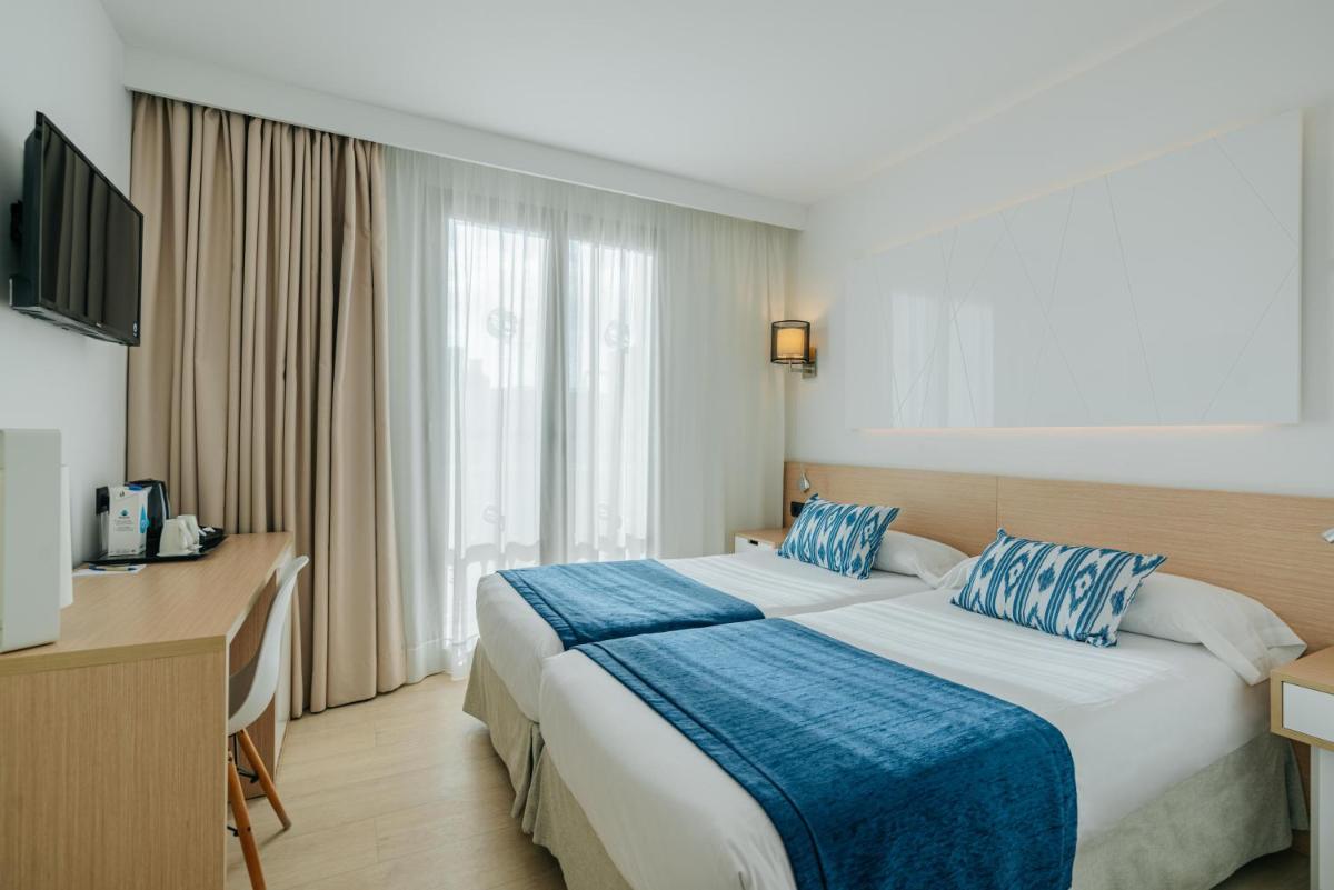 Cama o camas de una habitación en THB Felip - Adults Only