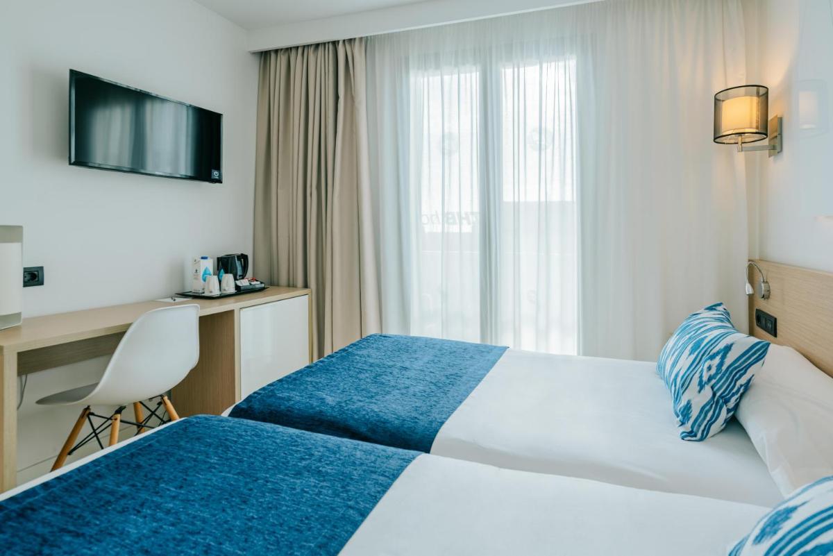 Cama o camas de una habitación en THB Felip - Adults Only