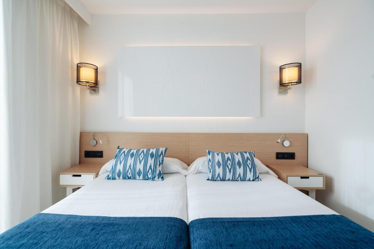 Cama o camas de una habitación en THB Felip - Adults Only