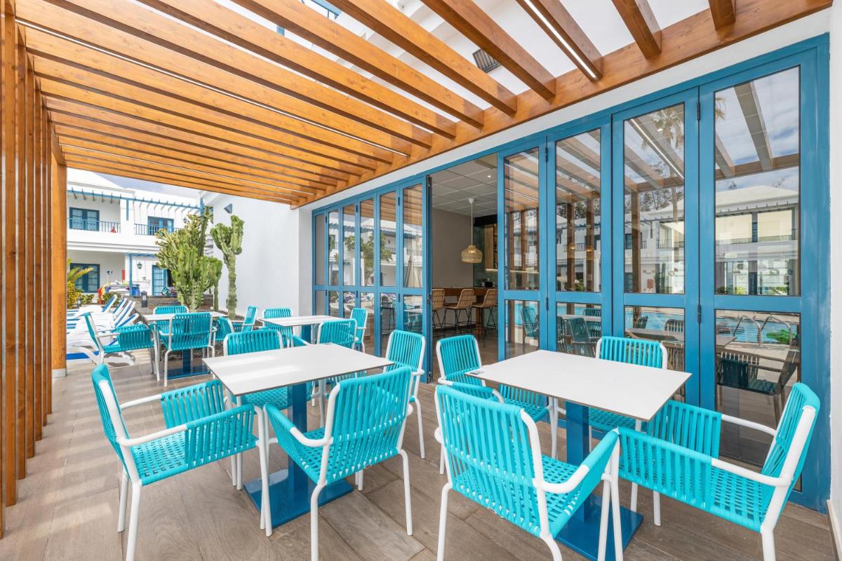 Un restaurante o sitio para comer en THB Tropical Island