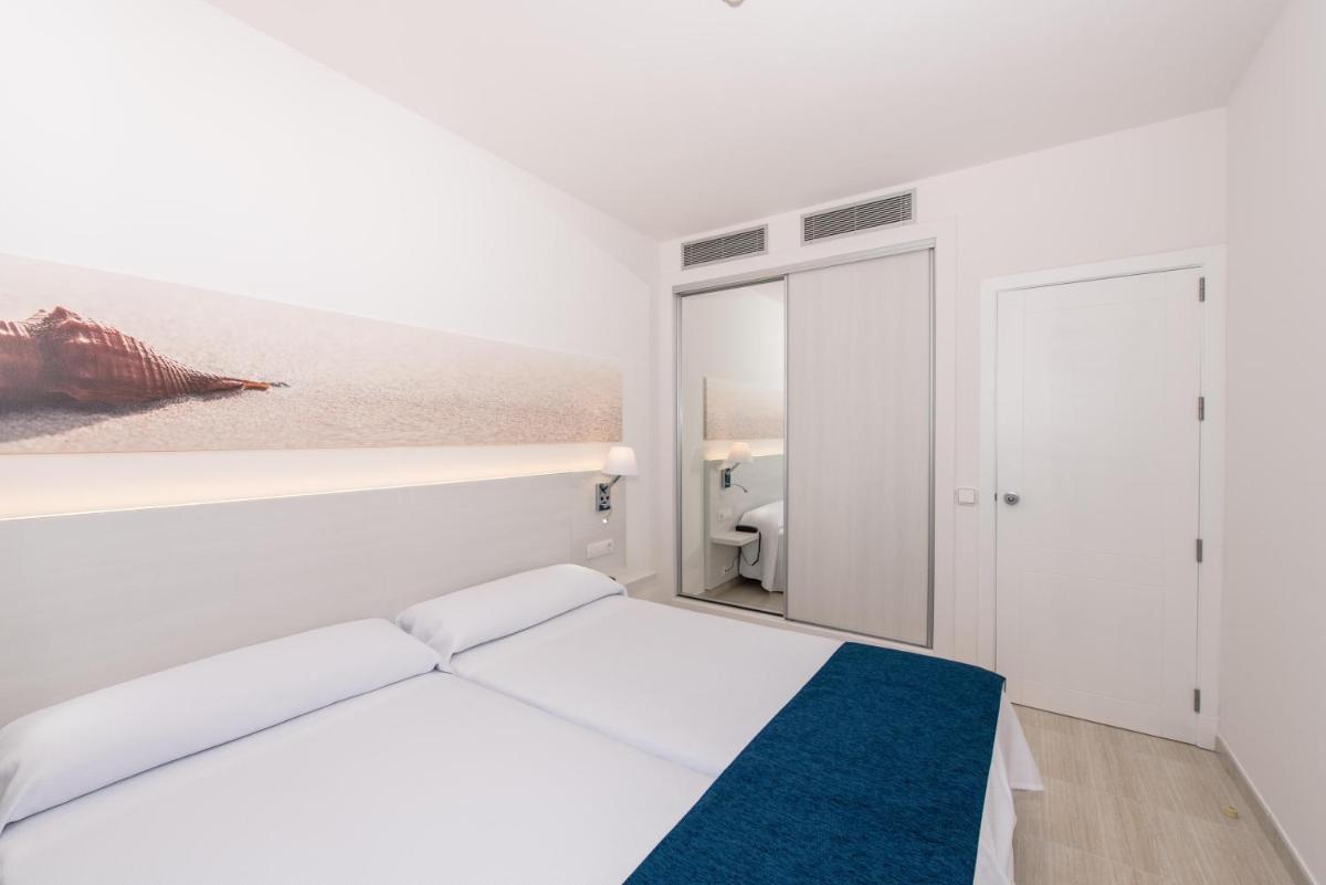 Cama o camas de una habitación en THB Tropical Island